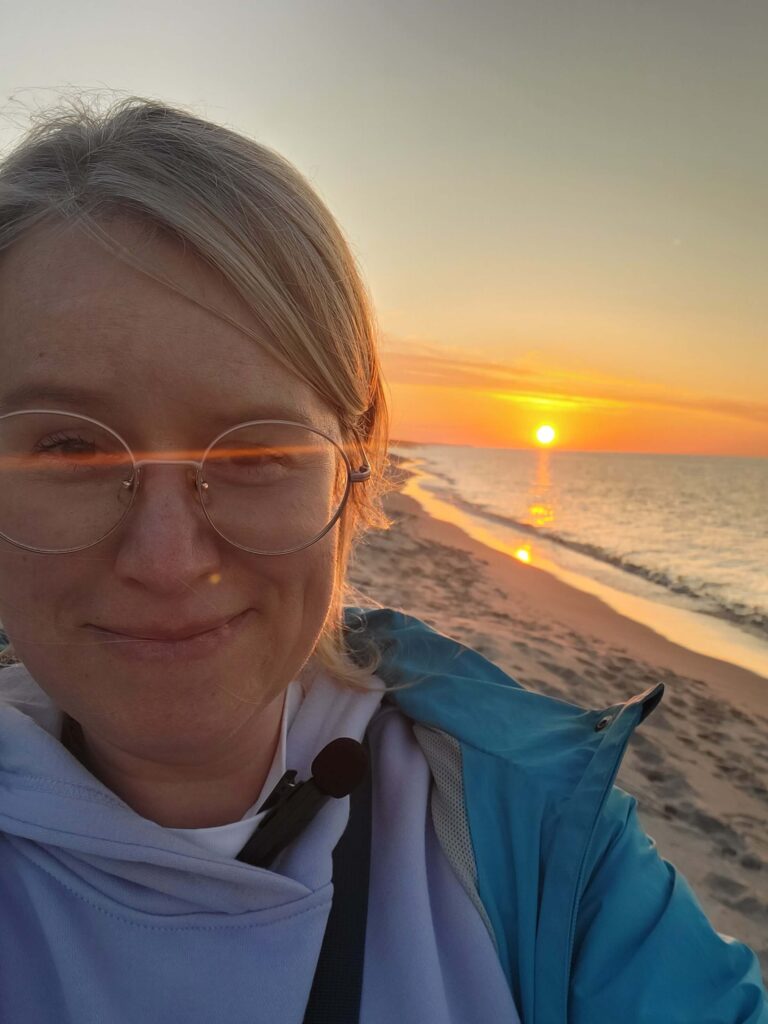 Aleksandra's selfie with sunset at the beach